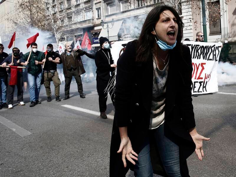 Protesters and riot police clash in Athens after a rally in honour of the 57 victims of Greece's deadliest train crash which took place last week. EPA