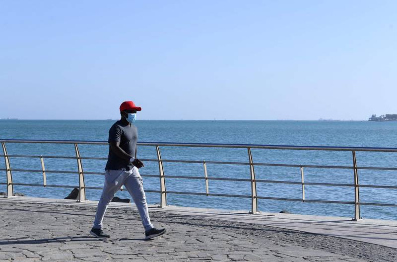 A man walks at the seafront promenade in the Saudi port city of Jeddah.  AFP