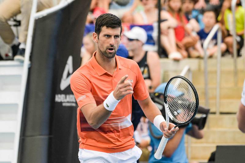 Novak Djokovic reacts to winning a point. AFP