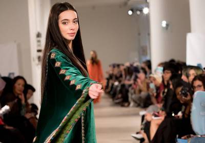 A model showcases a Saudi Arabian designer at London Modest Fashion Week. "Modest wear" has become big business, with designers such as Dolce & Gabbana seeking a slice of the market. (Photo: Nimz Chana) 