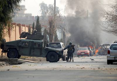 Afghan police officers arrive at the site of a blast and gun fire in Jalalabad, Afghanistan January 24, 2018.REUTERS/Parwiz