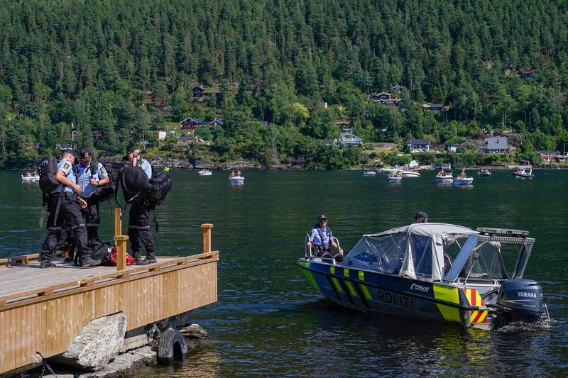 Norwegian police keep watch during the memorial service on Utoya, 10 years to the day since Breivik killed 77 people, most of whom were visiting a summer youth camp on the island. AFP