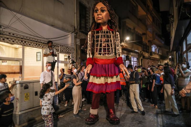 The puppet is part of 'The Walk,' an art initiative that will travel 8,000 kilometres in support of refugees.