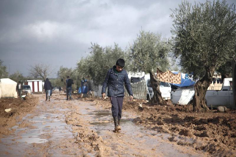 Location: Al-Karama camp in Atama. The aftermath of heavy rainfall on north Syria, residents lost their furniture, clothes and bedding as well as the tents waiting outside in open lands until the civil defense and NGs arrive to rescue them. All photos by Bader Taleb for The National