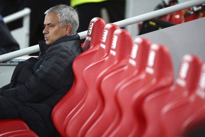 Manchester United manager Jose Mourinho sits pitchside ahead of the English Premier League match between Liverpool and Manchester United at Anfield in Liverpool, England, Monday, October 17, 2016. Dave Thompson / AP Photo