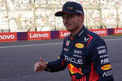 Red Bull driver Max Verstappen celebrates after securing pole position at the Japanese GP at the Suzuka Circuit, on September 23, 2023. AP