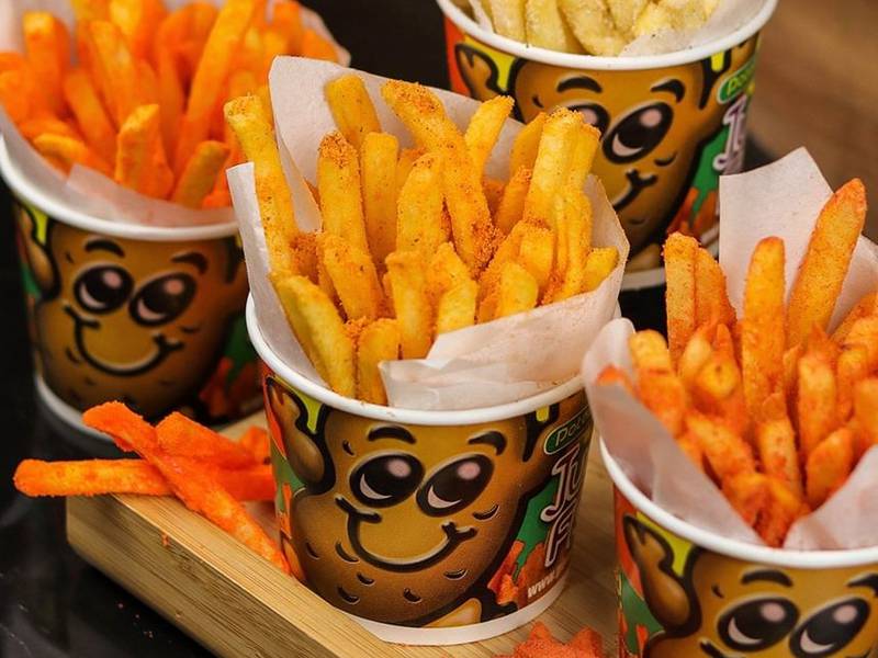 The brand is known for serving French fries in flavours such as barbecue, cheese and sour cream. Photo: Instagram / @potatocorneruae