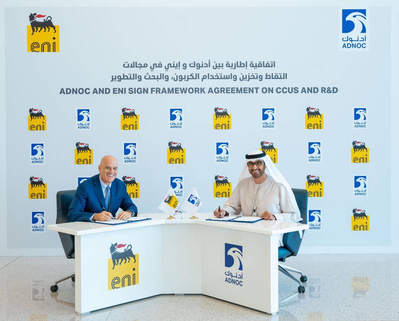 Eni chief executive Claudio Descalzi signs the agreement with UAE Minister of State and Adnoc group chief executive Dr Sultan Al Jaber, Image courtesy of Adnoc