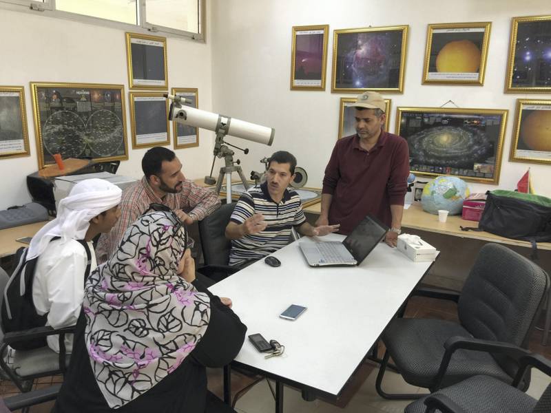 Mohammad Odeh, chairman of the International Astronomy Centre, speaks with his team of experts at the International Astronomy Centre HQ in Al Bateen, Abu Dhabi. International Astronomical Center