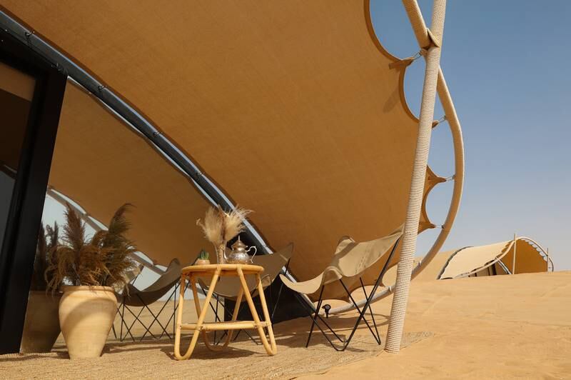The 'nests' blend into the dunes. Photo: The Nest by Sonara