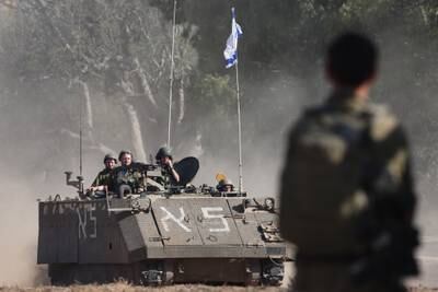 Israeli soldiers patrol the border with southern Gaza. Many Palestinians stayed put in the northern Gaza Strip, despite Israel's warning to head south. EPA