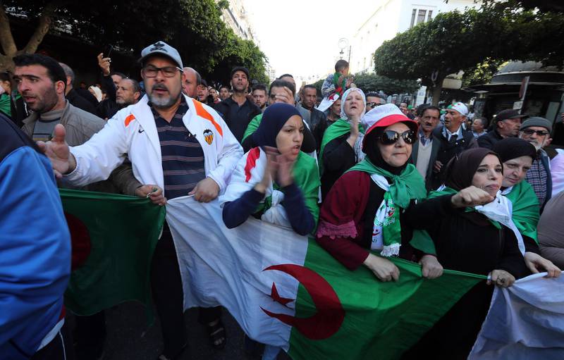 Algerians shout slogans as they march to mark the first anniversary of the popular protests in Algiers, Algeria.  EPA