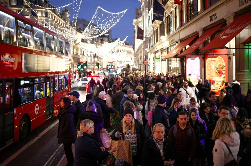 Christmas shoppers on Regent Street, central London. Reuters