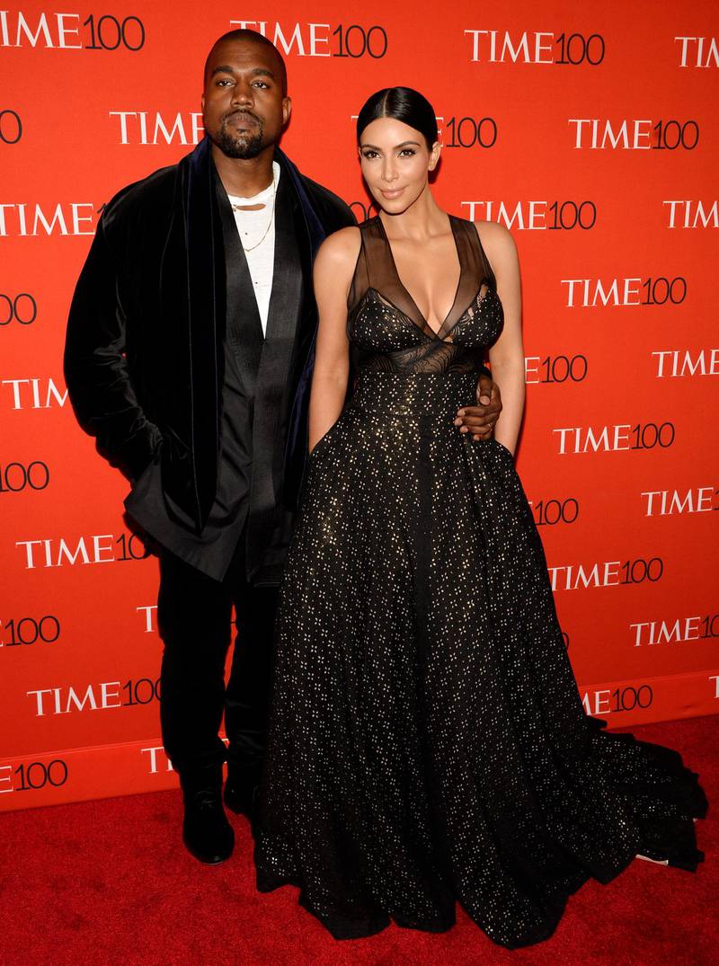 epa04715347 US musician Kanye West (L) and his wife Kim Kardashian (R) arrive for the Time 100 Gala at Frederick P. Rose Hall in New York, New York, USA, 21 April 2015. The event is a celebration of Time Magazine's annual issue recognizing 100 of the world's most influential people.  EPA/JUSTIN LANE