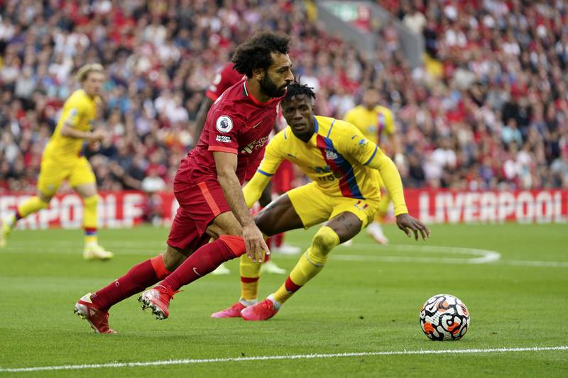 Liverpool forward Mohamed Salah runs with the ball. AP