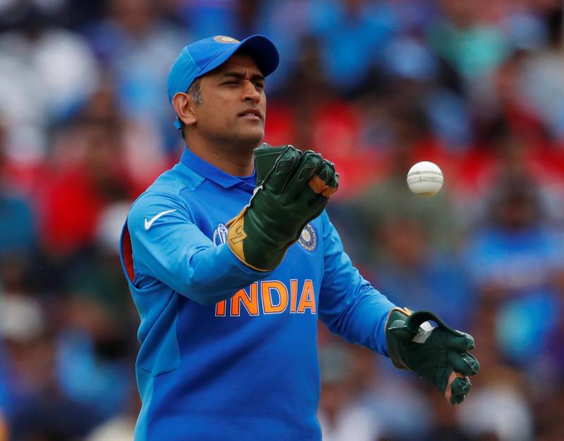 Cricket - ICC Cricket World Cup - India v Australia - The Oval, London, Britain - June 9, 2019    India's MS Dhoni wearing his new gloves without an emblem on them    Action Images via Reuters/Andrew Boyers