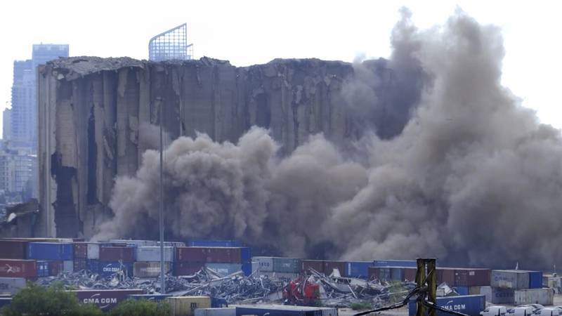 Video footage shows clouds of smoke and dust spreading across the port. AP