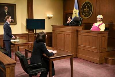 Mikey Day as a lawyer, Cecily Strong as a judge, and host Elon Musk as Wario during the "Wario" sketch on NBC's 'Saturday Night Live', in May. Getty Images