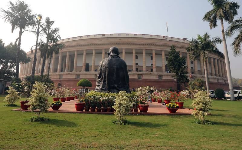 A general view of the statue of Mahatma Gandhi overlooking the Indian Parliament House in New Delhi. EPA
