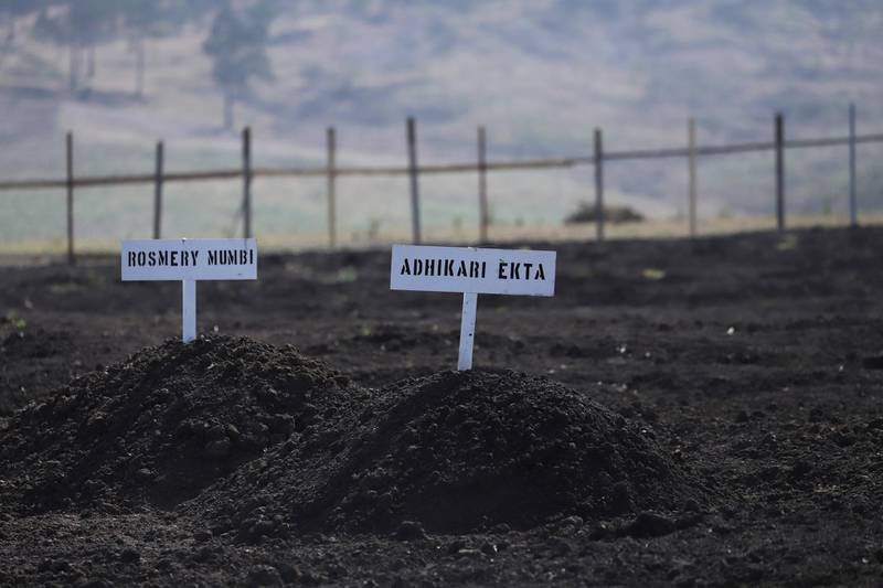Signs with the names of victims of Ethiopian Airlines Flight ET302 crash are seen during a memorial service at the crash site near Bishoftu, Ethiopia.  Reuters