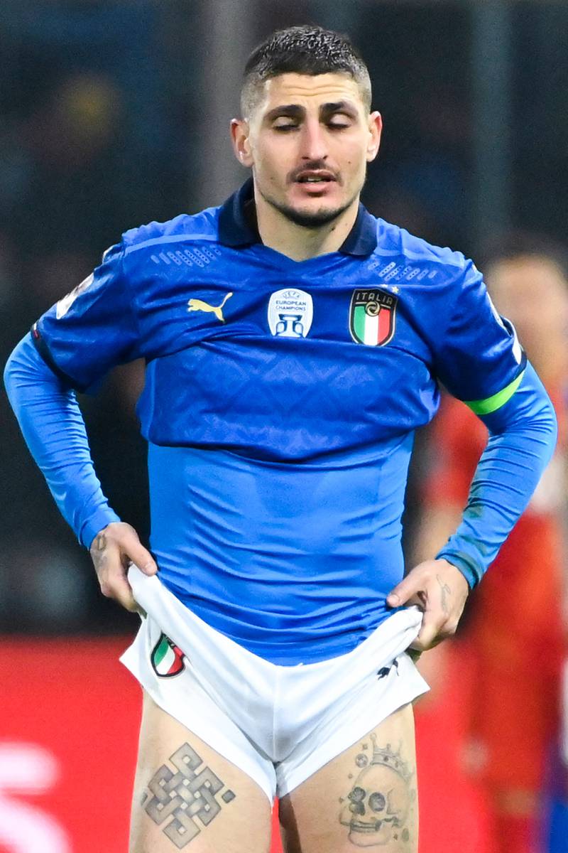 Italy's midfielder Marco Verratti reacts at the end of their shock qualifying play-off defeat at home to North Macedonia. AFP