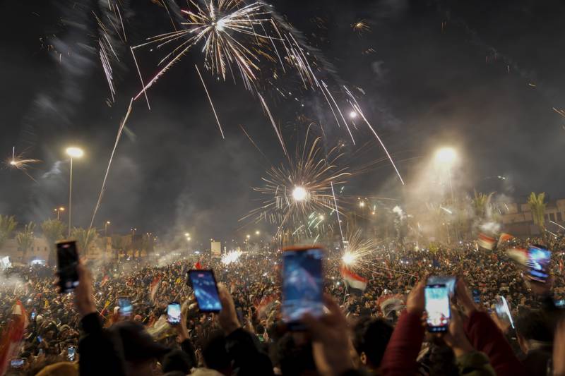 Outside the stadium and in Baghdad, fireworks lit up the night sky. AP