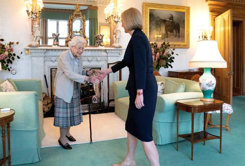 Queen Elizabeth II welcomes Liz Truss during an audience where she invited the newly elected leader of the Conservative party to become Prime Minister and form a new government, at Balmoral Castle, Scotland, Britain September 6, 2022. Reuters