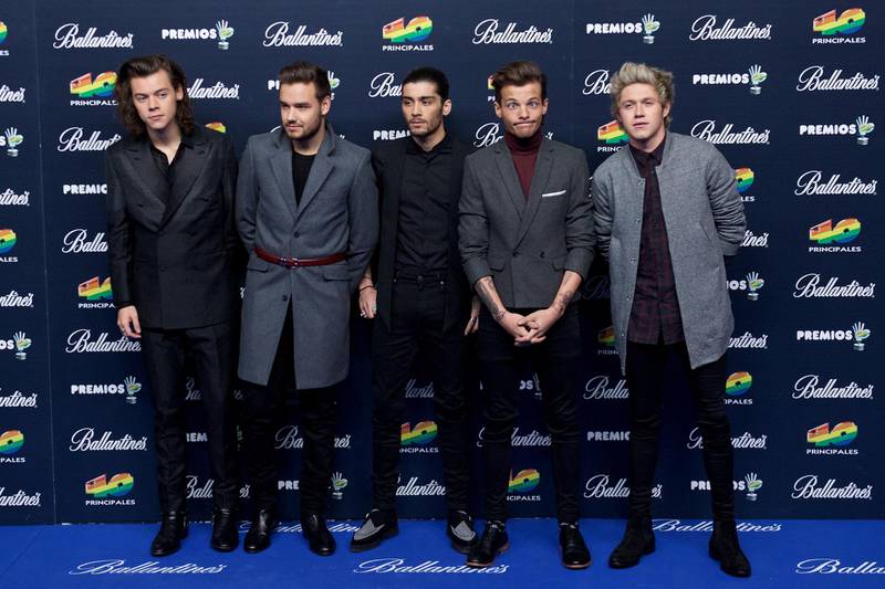 MADRID, SPAIN - DECEMBER 12:  (L-R)  Harry Styles, Liam Payne, Zayn Malik, Louis Tomlinson and Niall Horan of One Direction attend the 40 Principales Awards 2014 photocall at the Barclaycard Center (Palacio de los Deportes) on December 12, 2014 in Madrid, Spain.  (Photo by Carlos Alvarez/Getty Images)