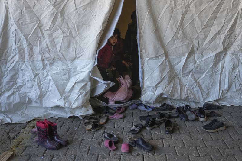 A Syrian child in a tent in the Islahiye district. AP