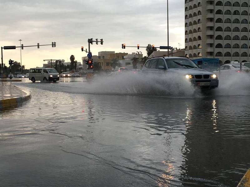 Police and road safety experts have urged motorists to drive with caution as strong winds downed trees and heavy rain led to flooding in some areas of the capital. Liz Claus / The National