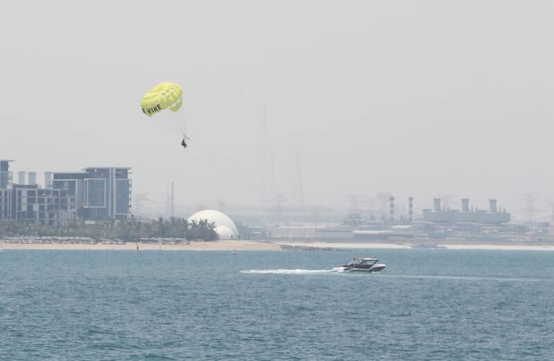 Parasailing is a good way to keep cool in Dubai Marina during the hot and humid spell in Dubai.