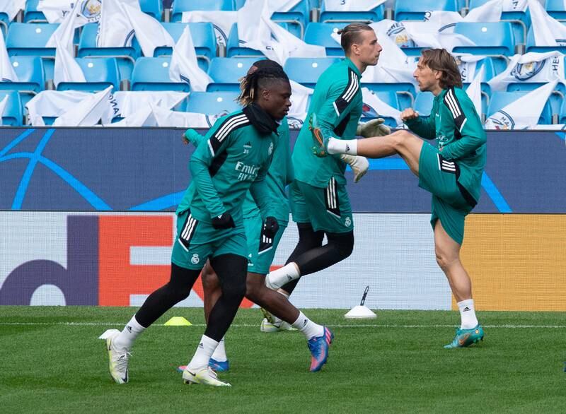 Real Madrid's Luka Modric and teammates attend their training session in Manchester. EPA 