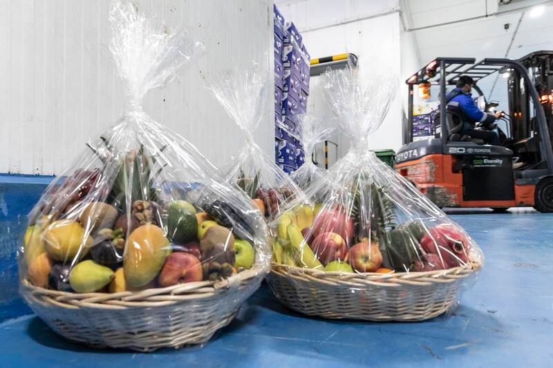 Workers at the warehouse also pack gift baskets of fruit and vegetables that are sent to charities.
