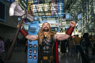 An attendee cosplay as Marvel superhero Thor. AP Photo