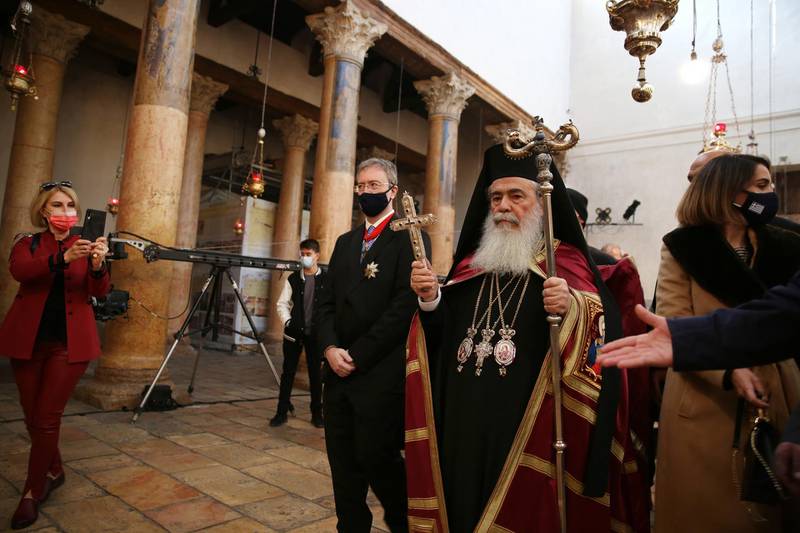 Greek Orthodox Patriarch of Jerusalem Theophilos III arrives at the Church of the Nativity during eastern Christmas in the West Bank city of Bethlehem. EPA