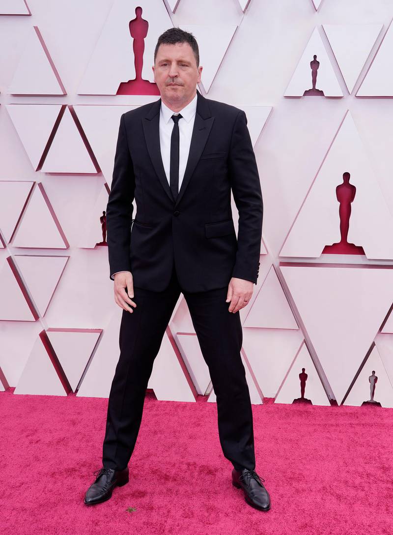 Atticus Ross arrives at the 93rd Academy Awards at Union Station in Los Angeles, California, on April 25, 2021. AP