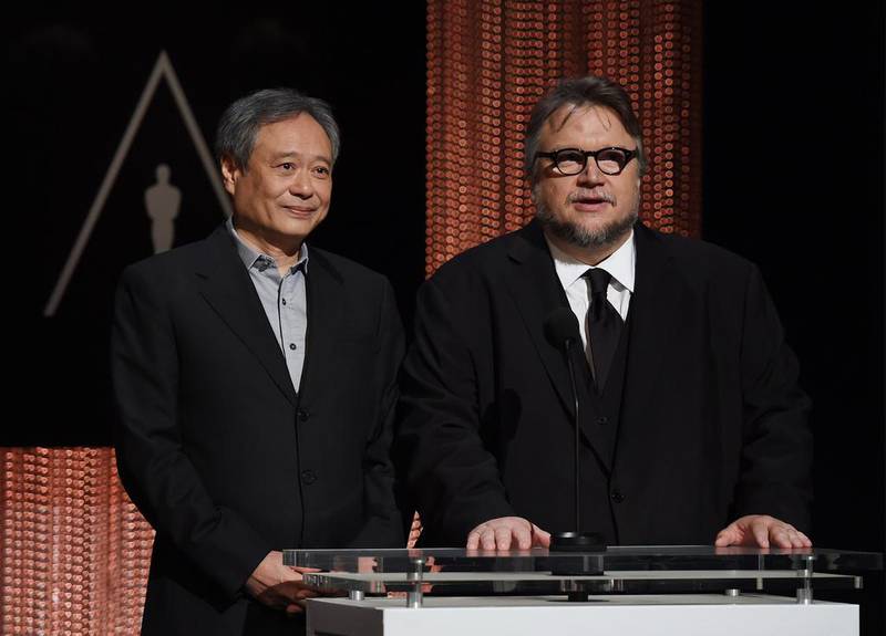 Director Ang Lee, left, and Guillermo del Toro at Academy Awards nominations. AFP