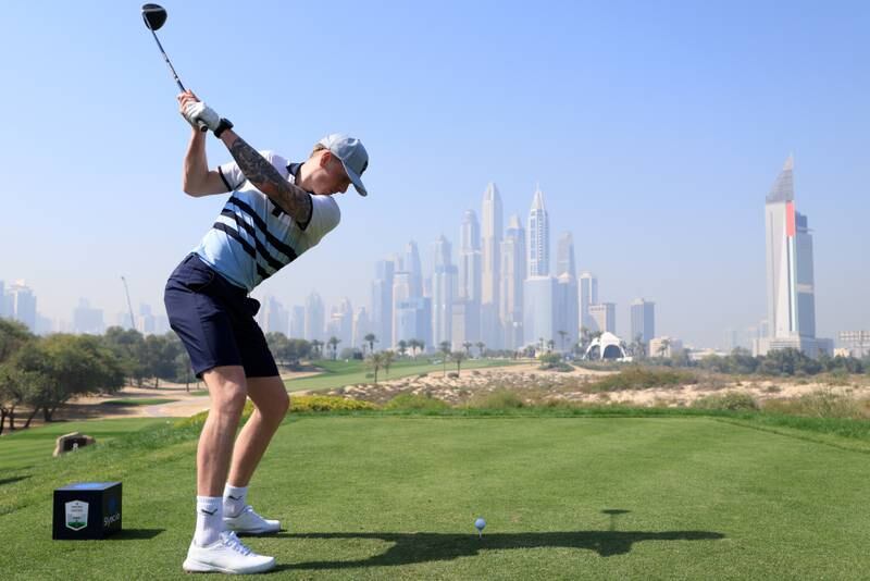 Jordan Pickford of Everton tees off on the 8th hole during a pro-am round prior to the Slync.io Dubai Desert Classic. Getty Images