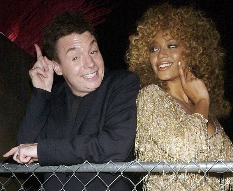 Mike Myers and Beyonce who co-starred in the film 'Austin Powers in Goldmember' pose at the post-premiere party at the Universal Amphitheatre in Los Angeles, July 22, 2002. Reuters