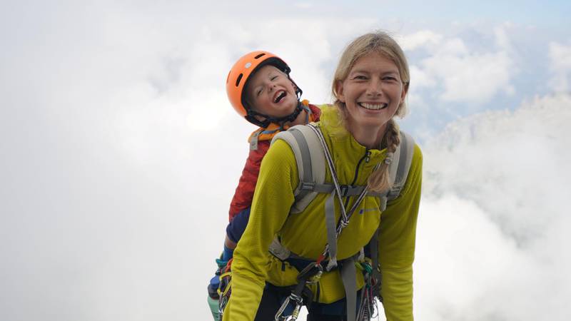 **Sent under embargo, no use before 14.00pm BST August 3 2020**
Jessica and Jackson Houlding on their three day trip to climb Piz Badile. See SWNS story SWPLclimb; A toddler and his seven-year-old sister have smashed records to become the youngest mountain climbers to scale a massive 10,000ft peak and were given a reward - of Haribo. Freya Houlding, seven, and three-year-old Jackson were literally following in their professional climber father's footsteps as he led them up Piz Badile on the border of Switzerland and Italy. Dad Leo Houlding, 40, spends his working life climbing some of the most dangerous and most remote mountains on earth, and his wife, 41-year-old Jessica, a GP, is an avid climber too. And now Freya has become the youngest person to climb the mountain unaided, and Jackson the youngest person to get to the top - 153 years to the day since the peak was first climbed. Jackon says he enjoyed his climb - and the sweets he got as a well done.