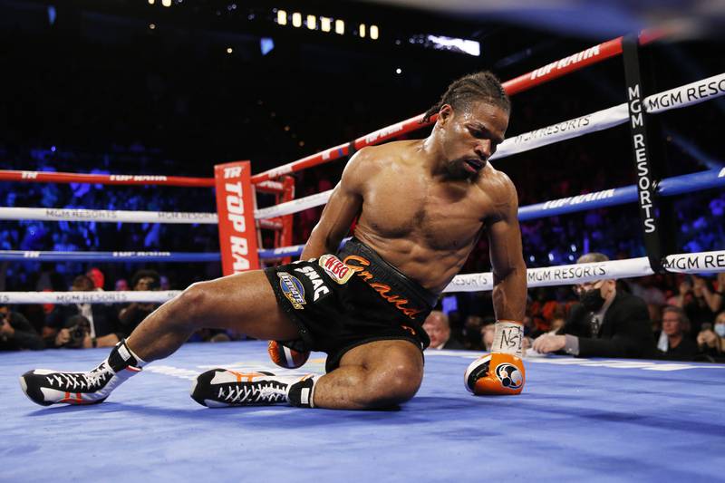 Shawn Porter lies on the mat after he was knocked down by Terence Crawford. AP Photo