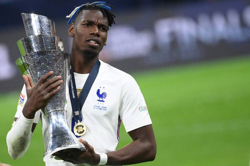 France midfielder Paul Pogba celebrates with the trophy. AFP