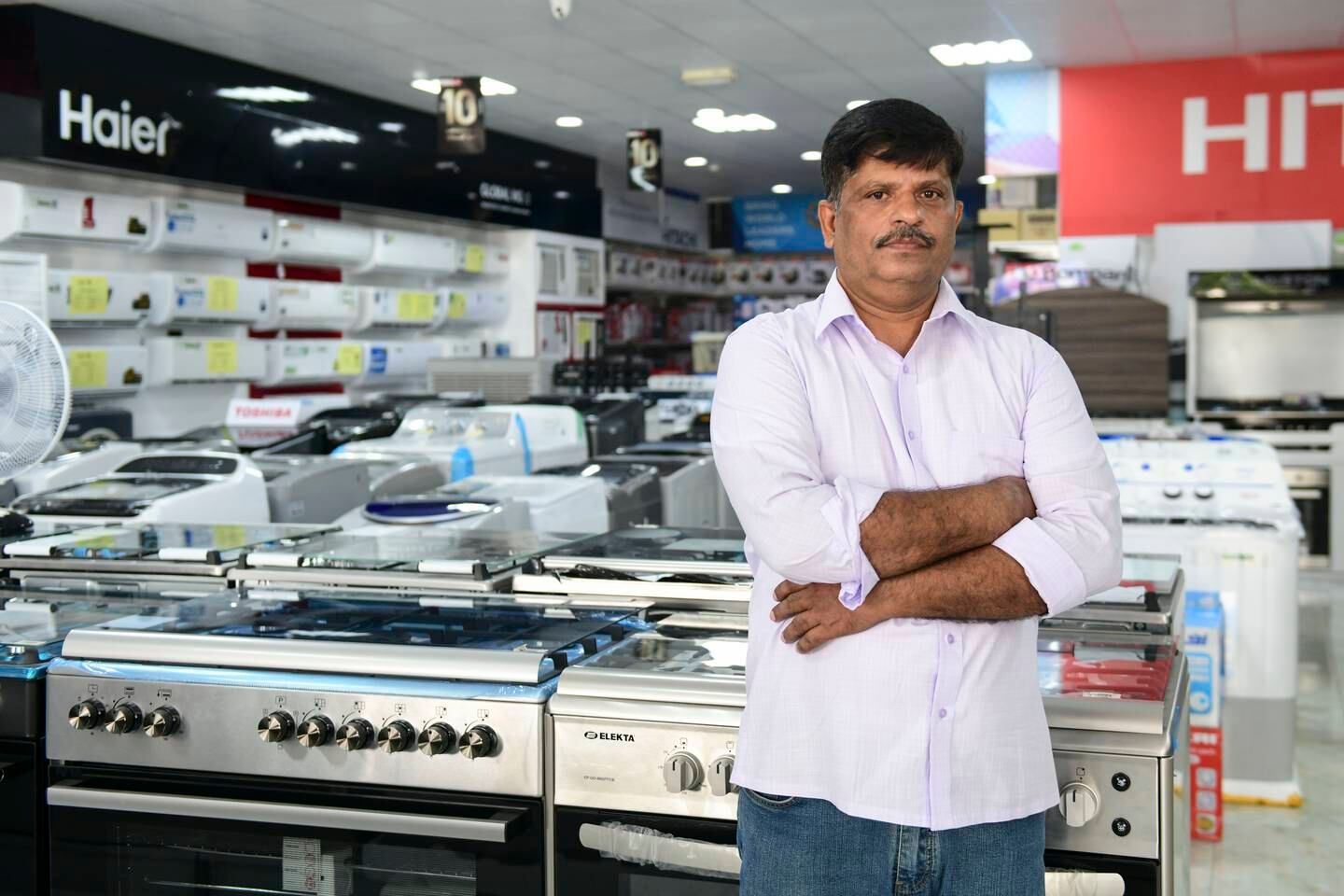 Mohamed Musthafa, manager of Universal Electronics in Fujairah, said the shop had to close for three days.  Khushnum Bhandari / The National
