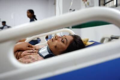 A woman undergoes treatment at a hospital in Nepalgunj. Reuters