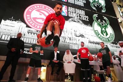 A freestyle performer puts on a show during the press conference for the NBA Abu Dhabi Games.