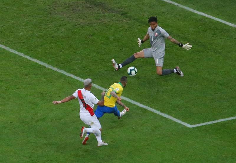 Brazil's Dani Alves scores their fourth goal. Reuters