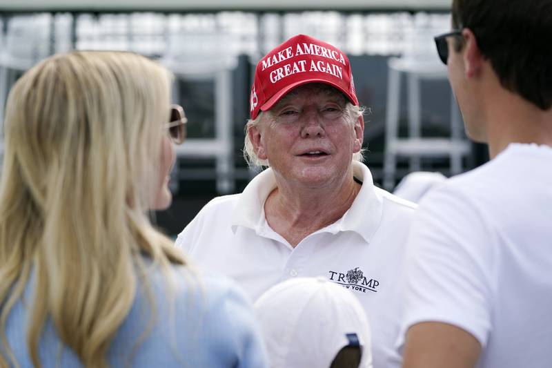 Former US president Donald Trump arrives for the pro-am at the Bedminster Invitational LIV Golf tournament in Bedminster, New Jersey, on July 28, 2022. AP