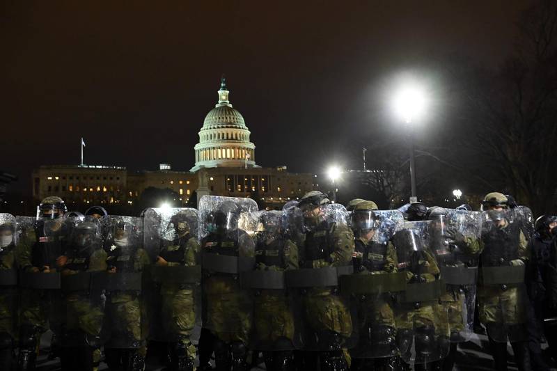 Riot police prepare to move demonstrators away from the US Capitol. AFP