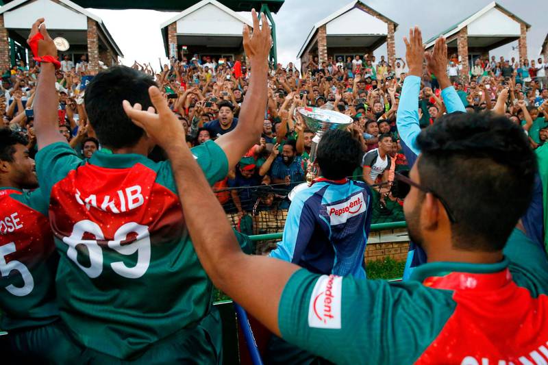 The Bangladesh cricket team celebrate with supporters after beating India to win the Under-19 World Cup  at Senwes Park, in Potchefstroom, South Africa, on Sunday, February 9. AFP