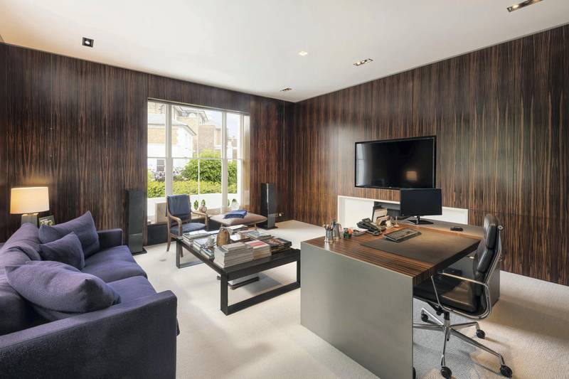 The study features refined oak panelling. Courtesy Knight Frank